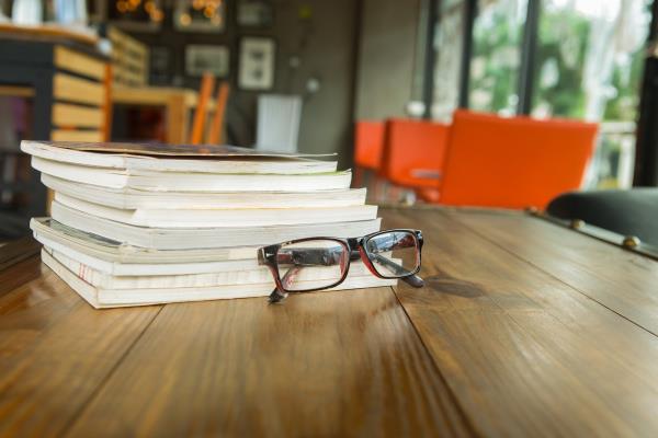 glasses on bookshelf