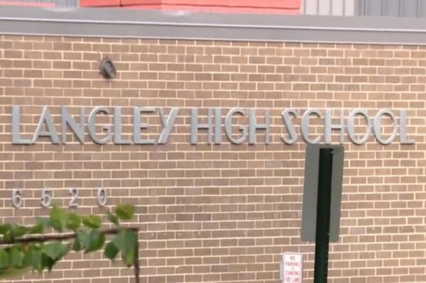 Sign on the brick wall of Langley High School